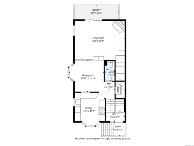 a picture of a bench in front of a wall