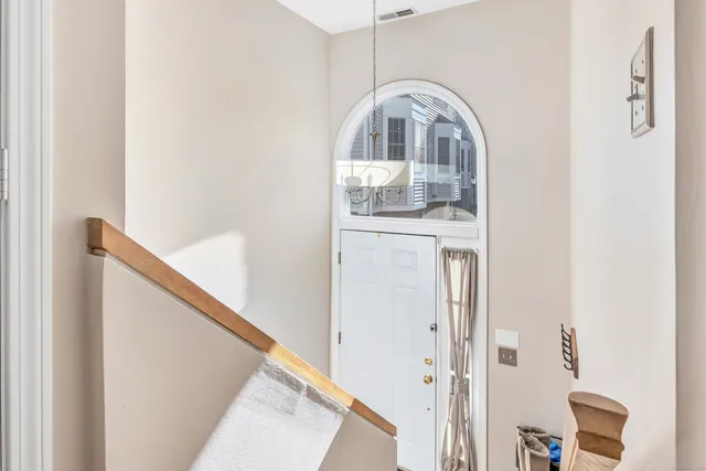 a view of a livingroom with wooden floor