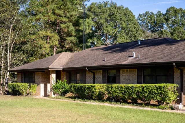 a view of a house with a swimming pool