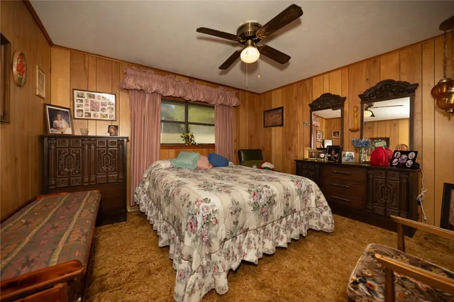 a view of a dining room with furniture and window
