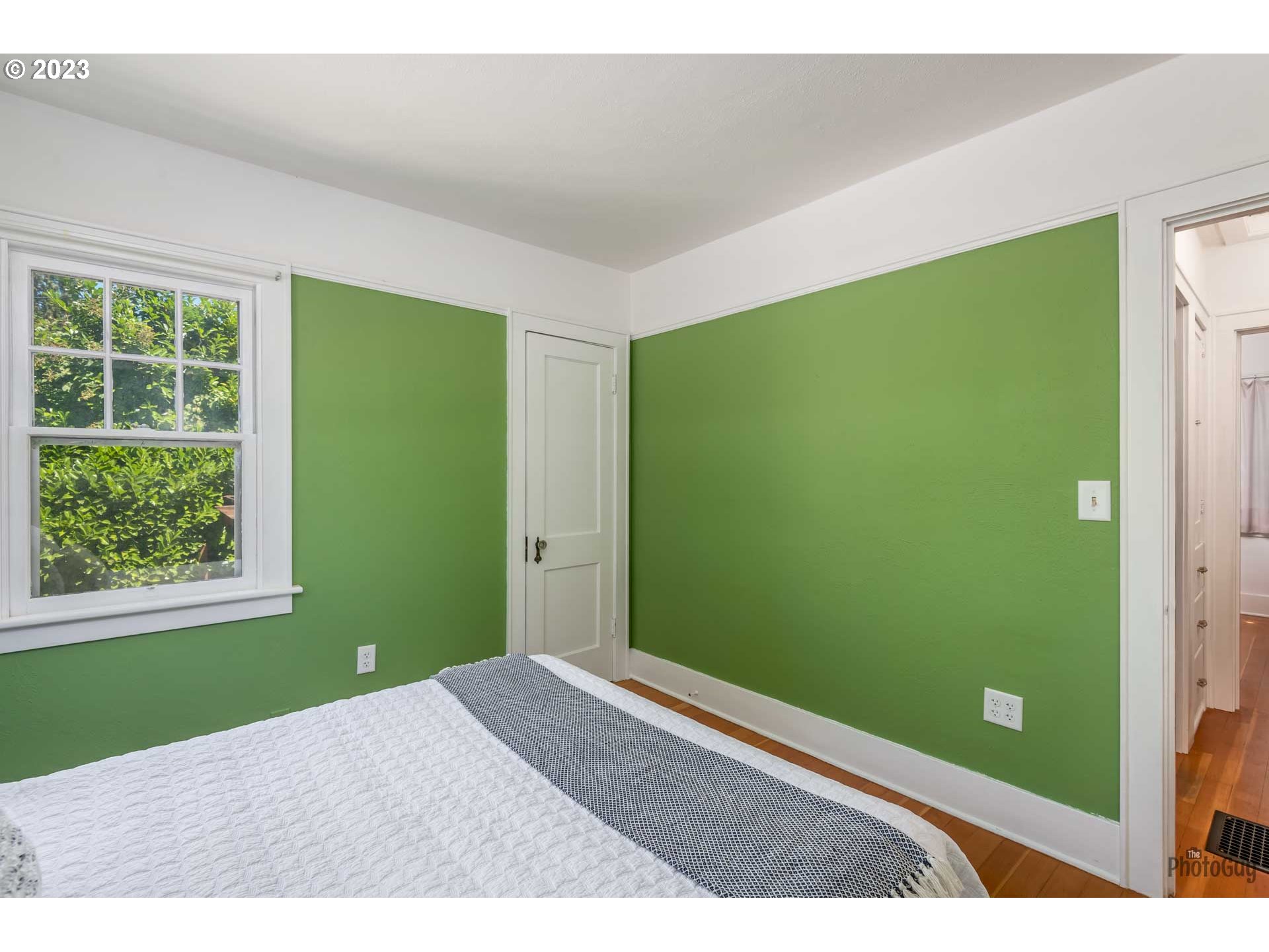 1041 Madison Street Eugene, OR 97402 - Photo 18 of 34 a bedroom with a large window