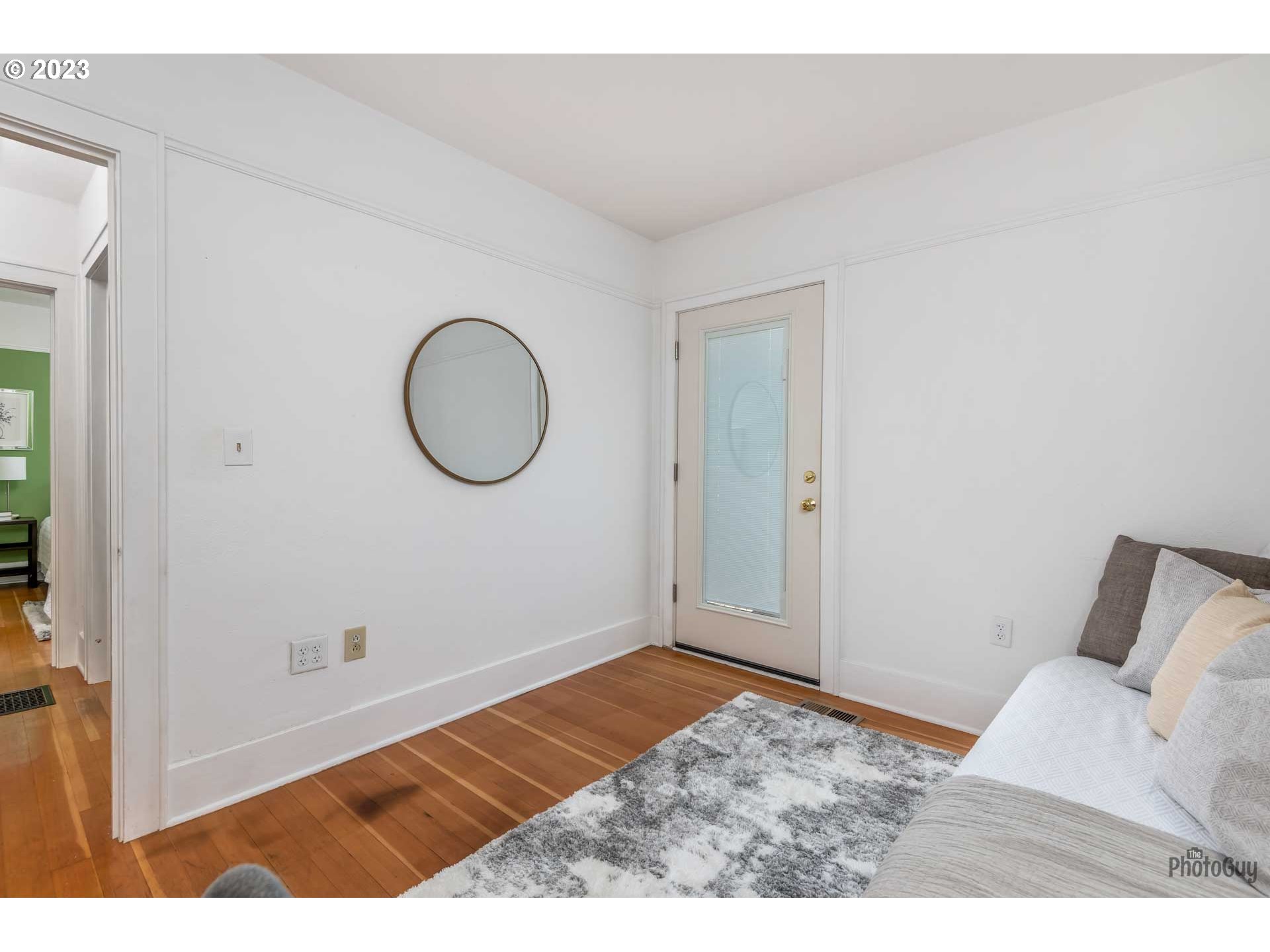 1041 Madison Street Eugene, OR 97402 - Photo 20 of 34 a bedroom with a bed and a window