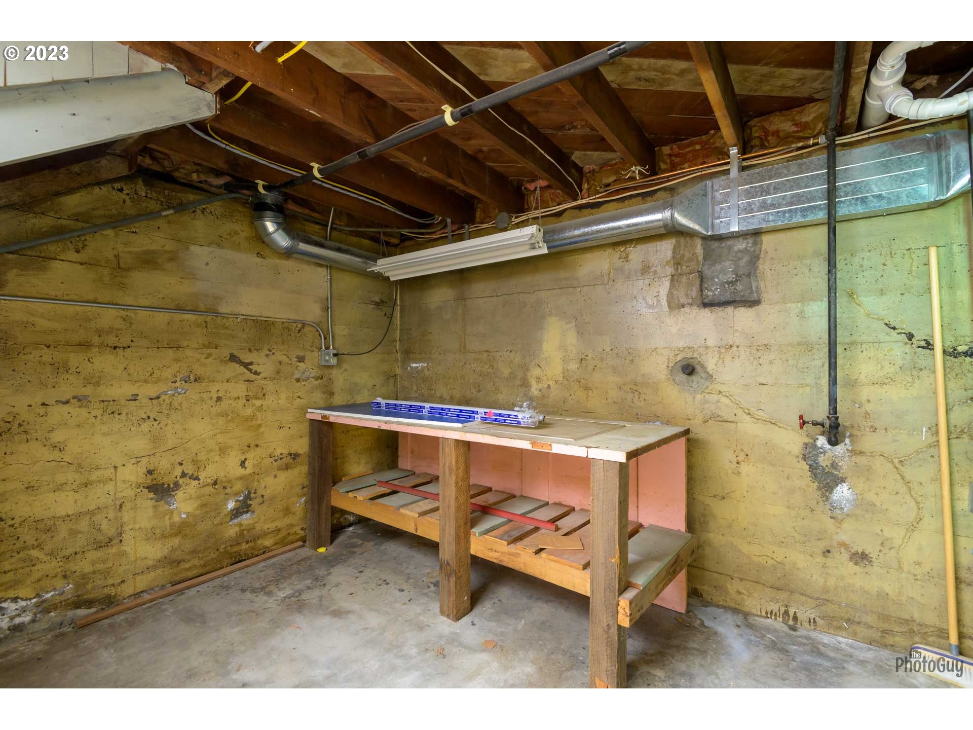 1041 Madison Street Eugene, OR 97402 - Photo 24 of 34 a utility room with a wooden floor