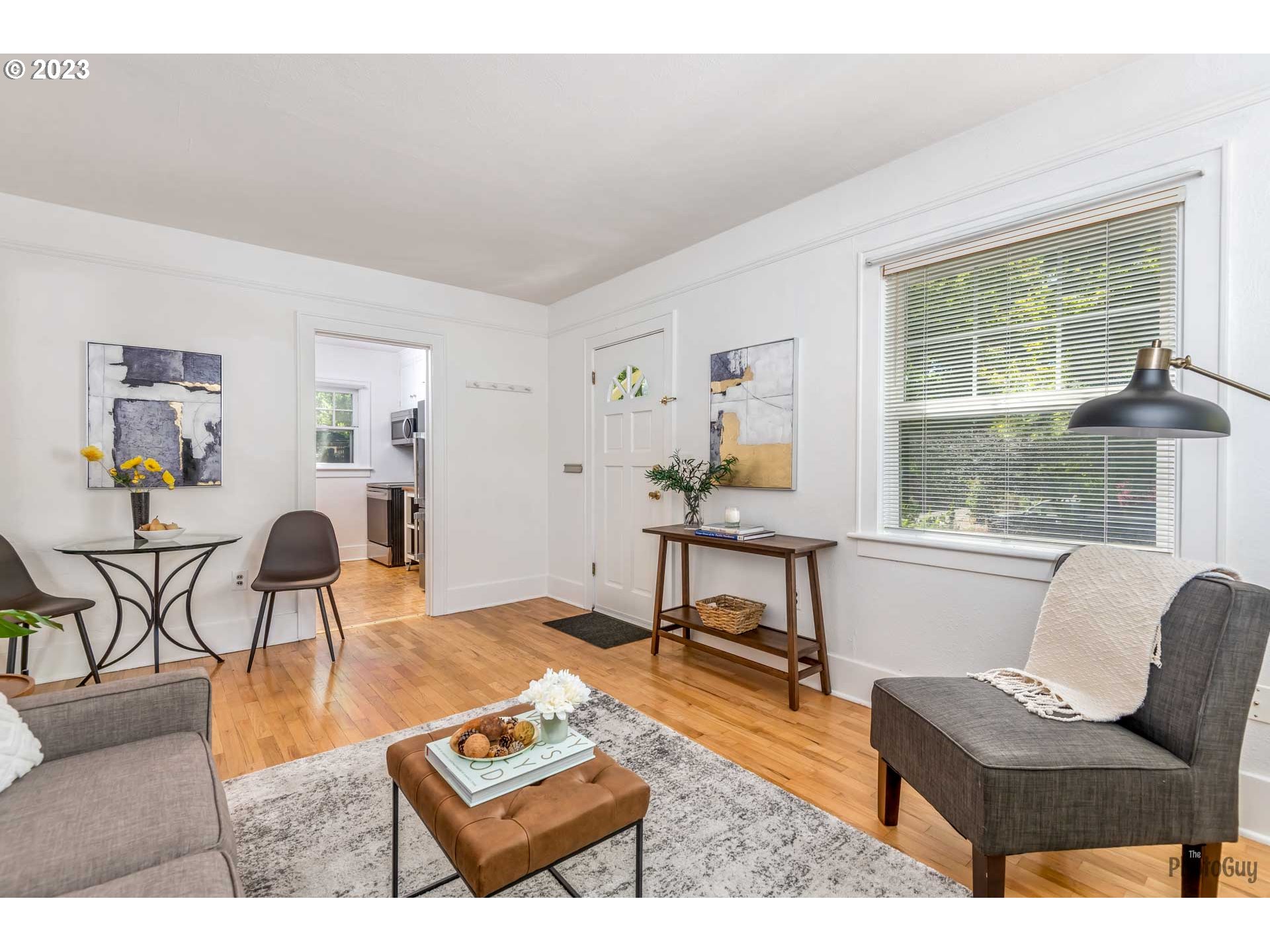 1041 Madison Street Eugene, OR 97402 - Photo 8 of 34 a living room with furniture and a window