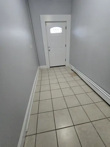 a view of an empty room and windows