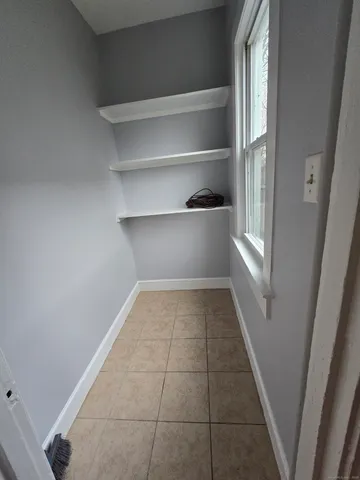 a view of a room with rack on the wall