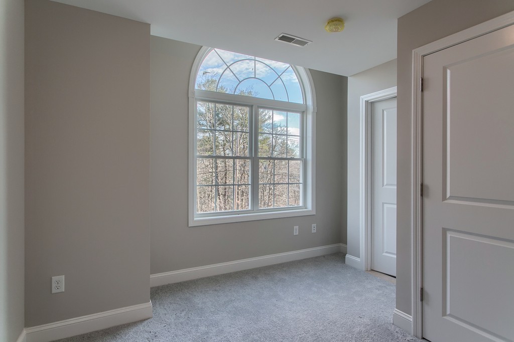1646 Mammoth Road Dracut, MA 01826 - Photo 21 of 27 an empty room with a window