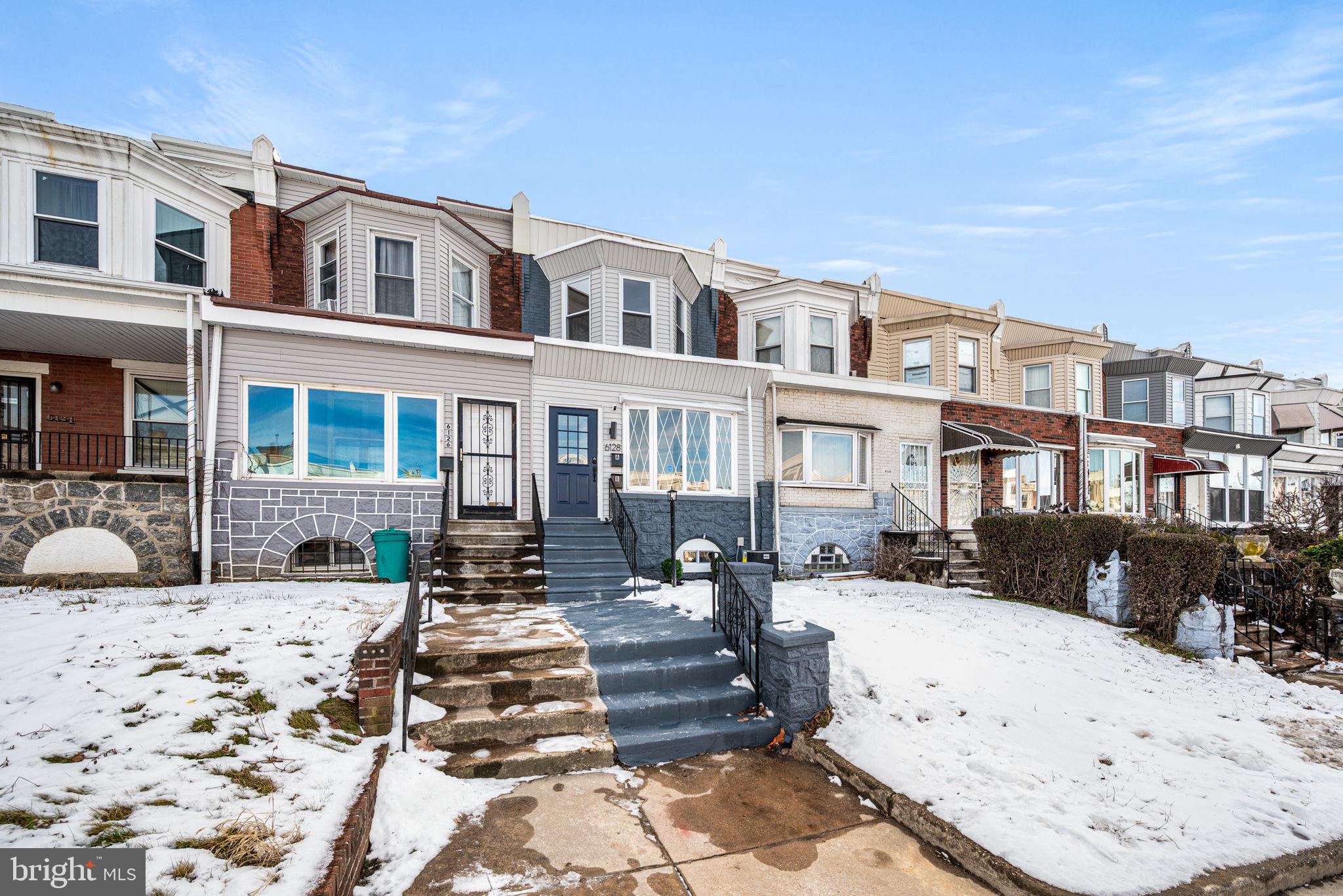 6128 Chestnut Street Philadelphia, PA 19139 - Photo 2 of 10 a view of a brick building next to a yard