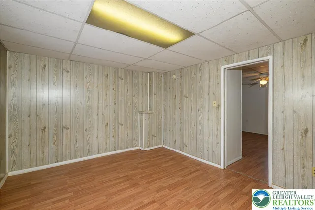 a view of hallway with wooden floor