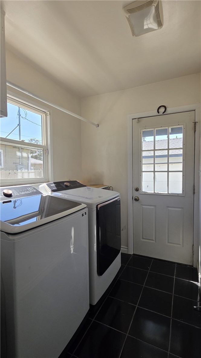 6637 Capps Avenue Reseda, CA 91335 - Photo 11 of 23 a utility room with dryer and washer