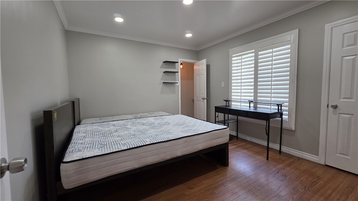 6637 Capps Avenue Reseda, CA 91335 - Photo 17 of 23 a bedroom with a bed and a window