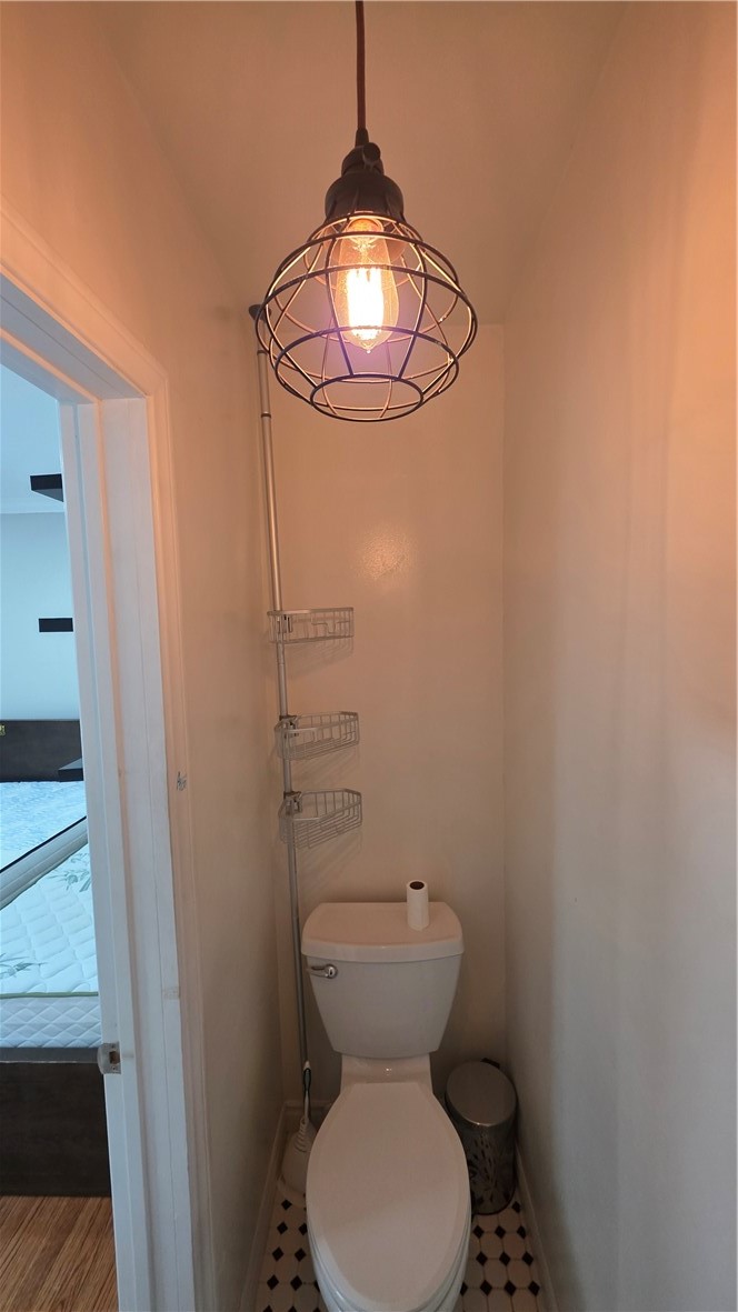 6637 Capps Avenue Reseda, CA 91335 - Photo 18 of 23 a bathroom with a toilet and a mirror