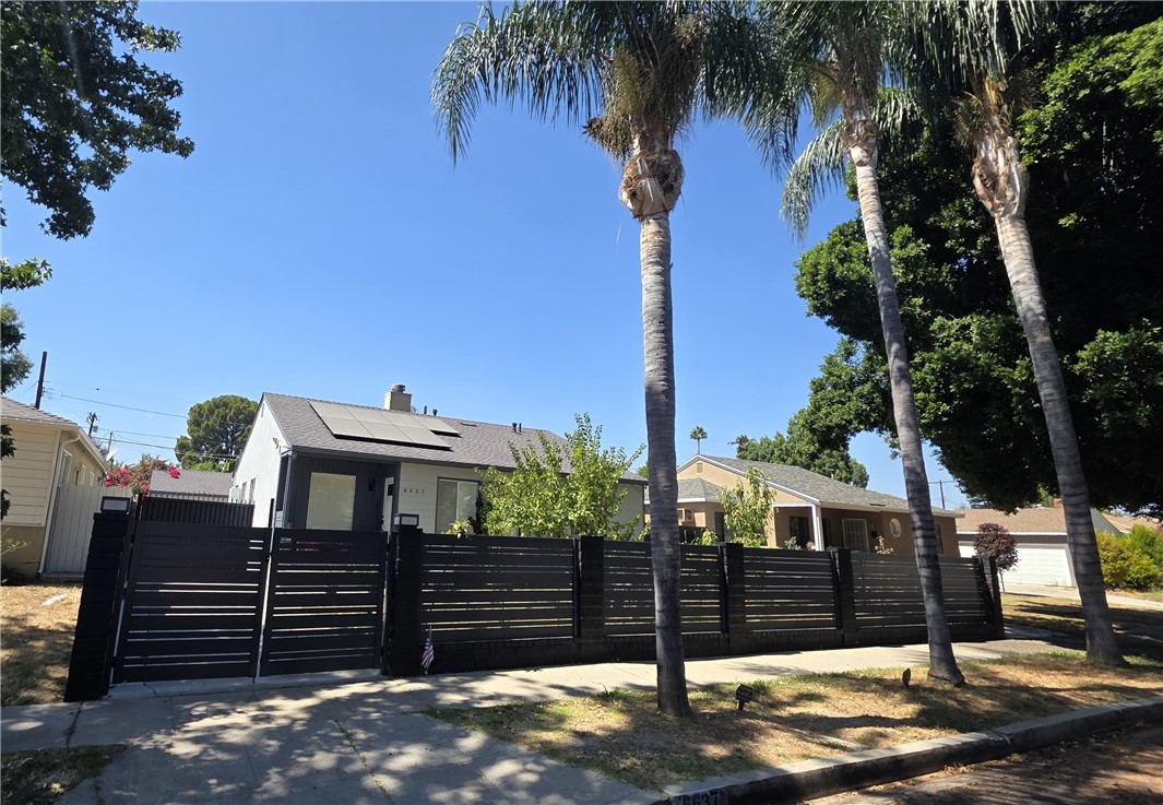 6637 Capps Avenue Reseda, CA 91335 - Photo 5 of 23 a view of a house with a tree