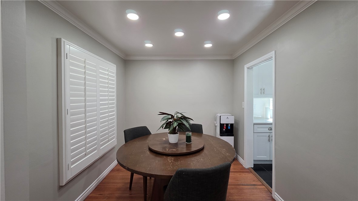 6637 Capps Avenue Reseda, CA 91335 - Photo 8 of 23 a view of a dining room with furniture and wooden floor