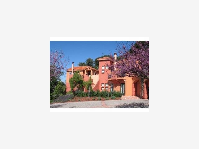 15668 Bohlman Road Saratoga, CA 95070 - Photo 1 of 9 a picture of a bench in front of a house