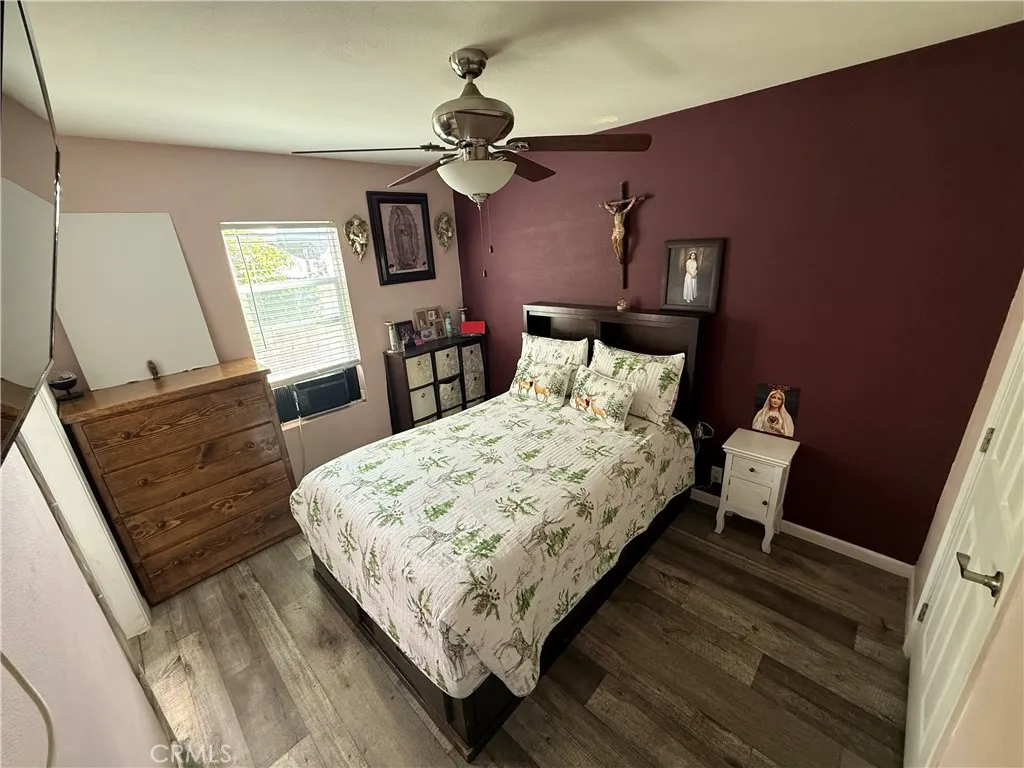 12700 Elliott, Unit 10 El Monte, CA 91732 - Photo 25 of 30 a bedroom with bed and window
