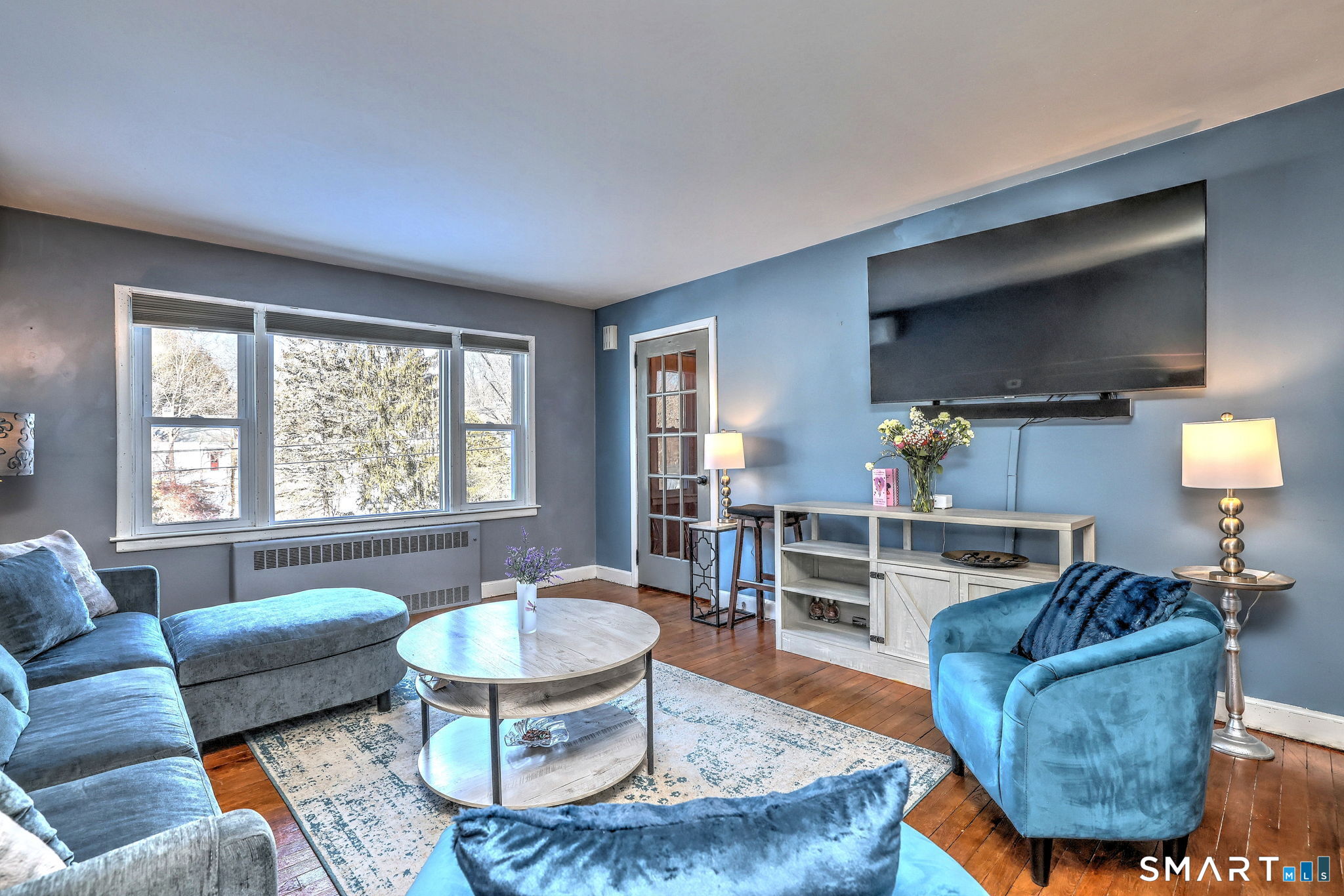 7 East Lake Road Trumbull, CT 06611 - Photo 16 of 42 a living room with furniture and a large window
