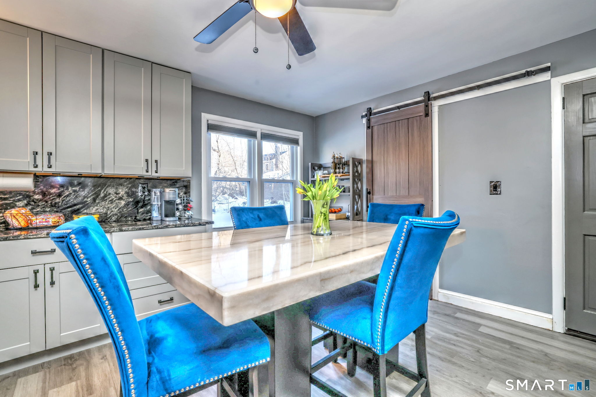7 East Lake Road Trumbull, CT 06611 - Photo 21 of 42 a view of a dining room with furniture and wooden floor