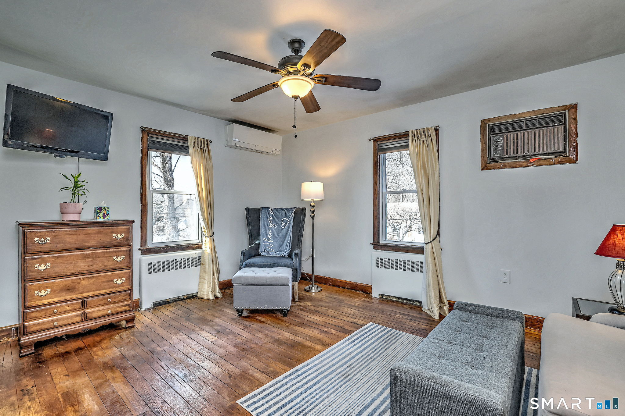 7 East Lake Road Trumbull, CT 06611 - Photo 26 of 42 a living room with furniture and a window
