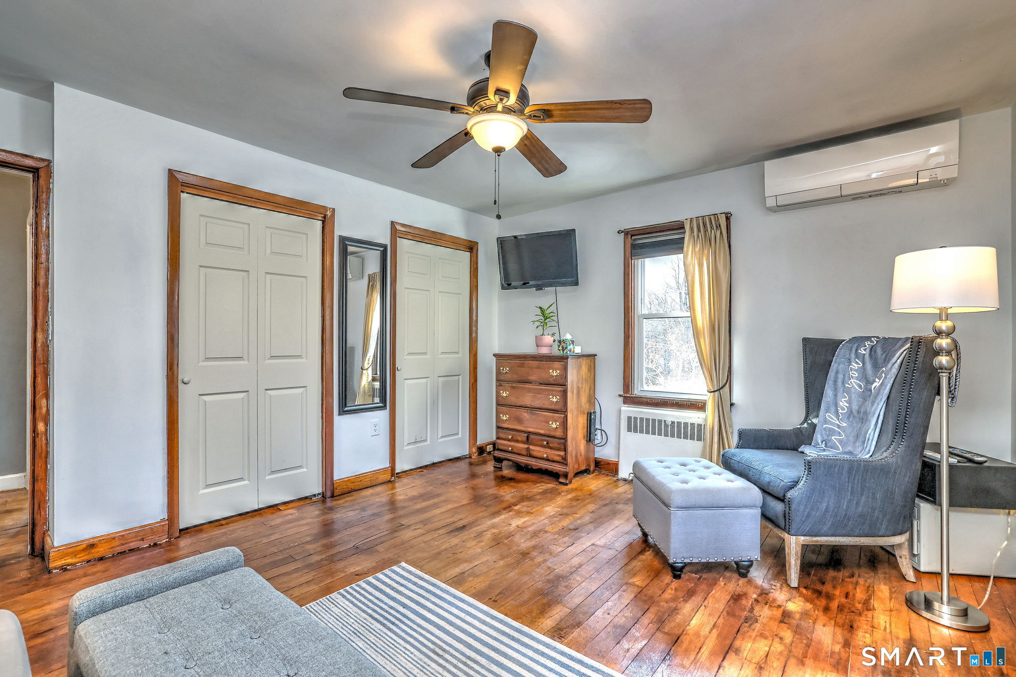 7 East Lake Road Trumbull, CT 06611 - Photo 28 of 42 a living room with furniture and a wooden floor