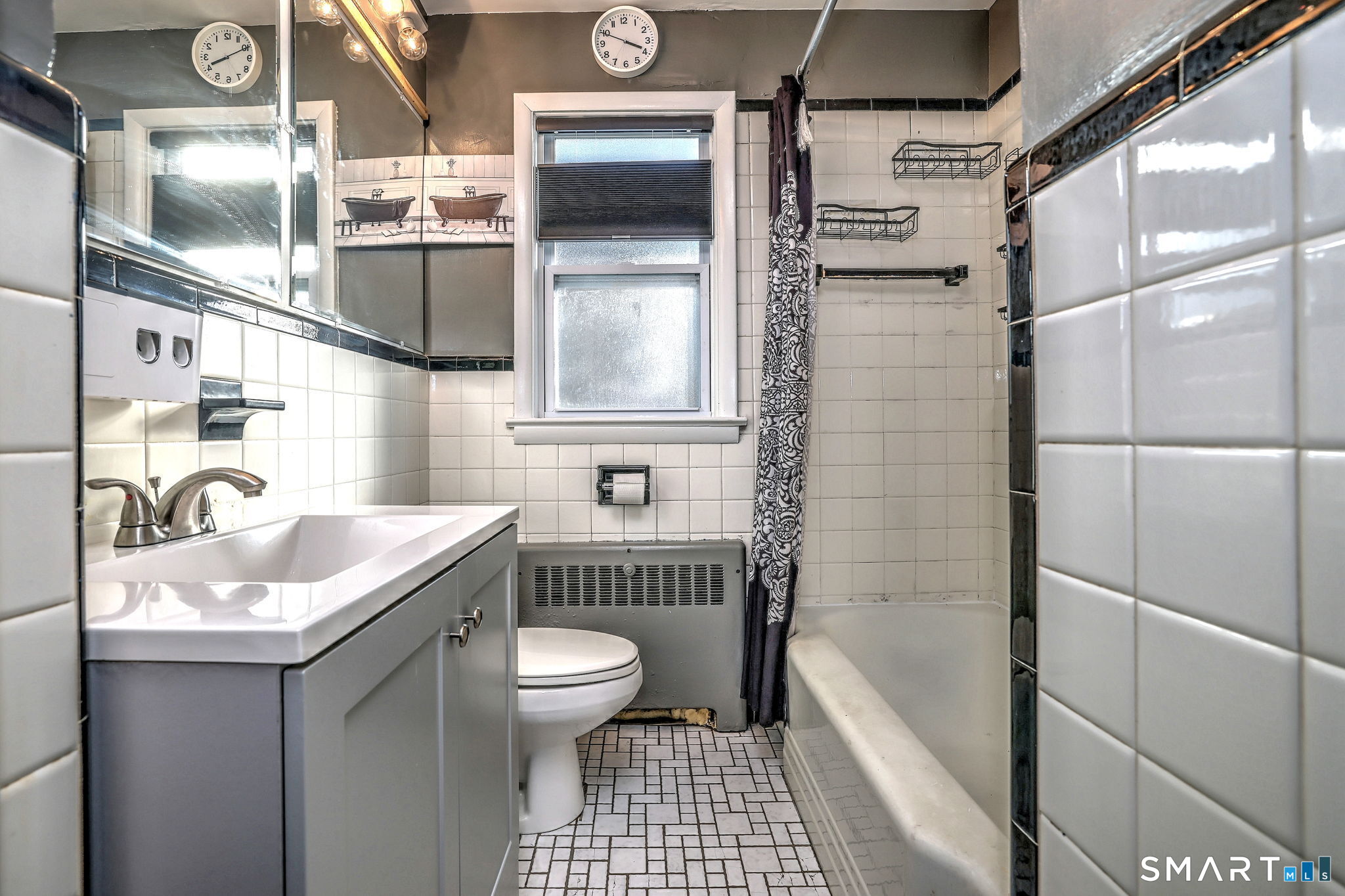 7 East Lake Road Trumbull, CT 06611 - Photo 33 of 42 a bathroom with a sink a toilet and shower