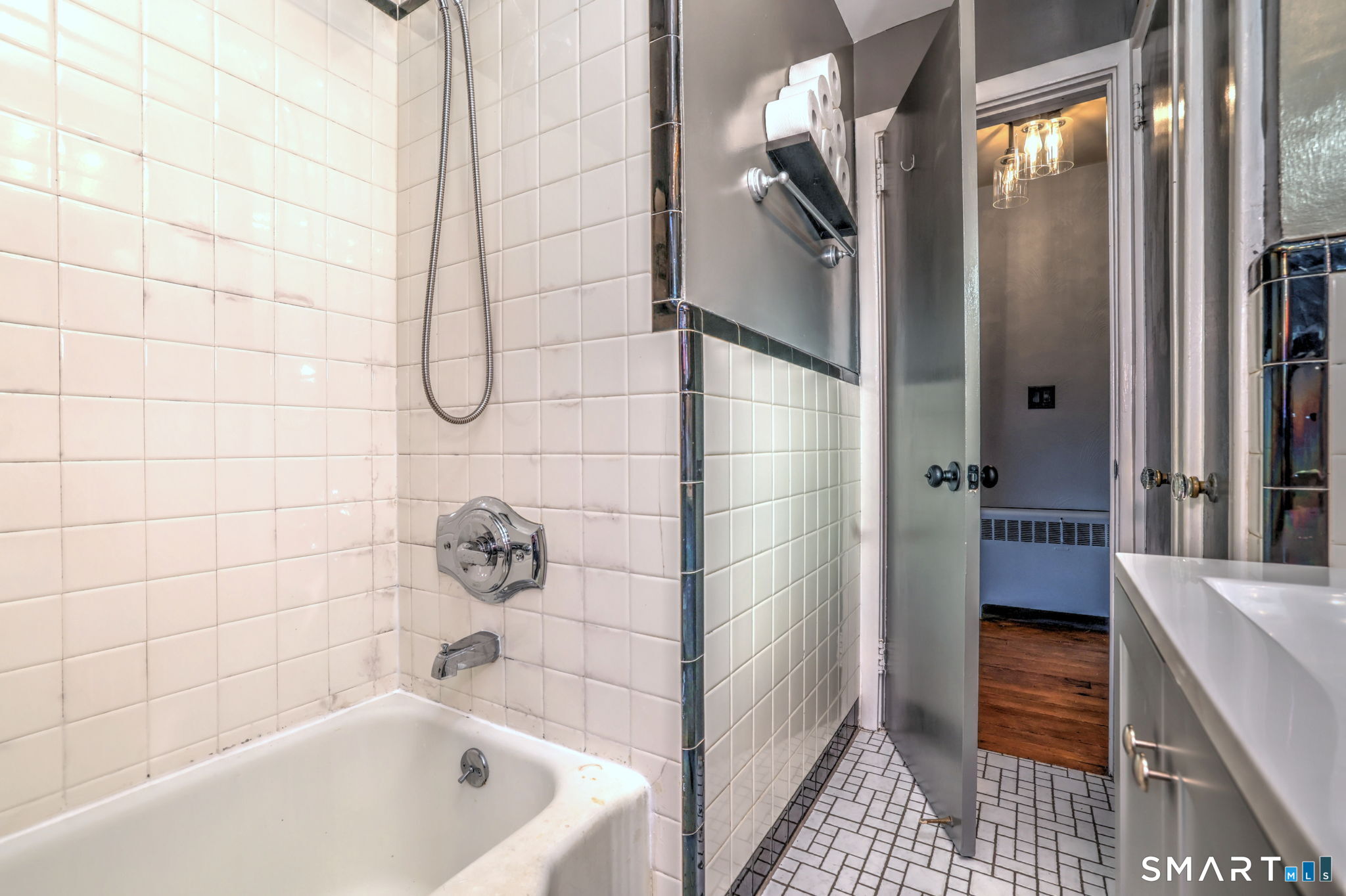 7 East Lake Road Trumbull, CT 06611 - Photo 34 of 42 a bathroom with a bathtub and a shower