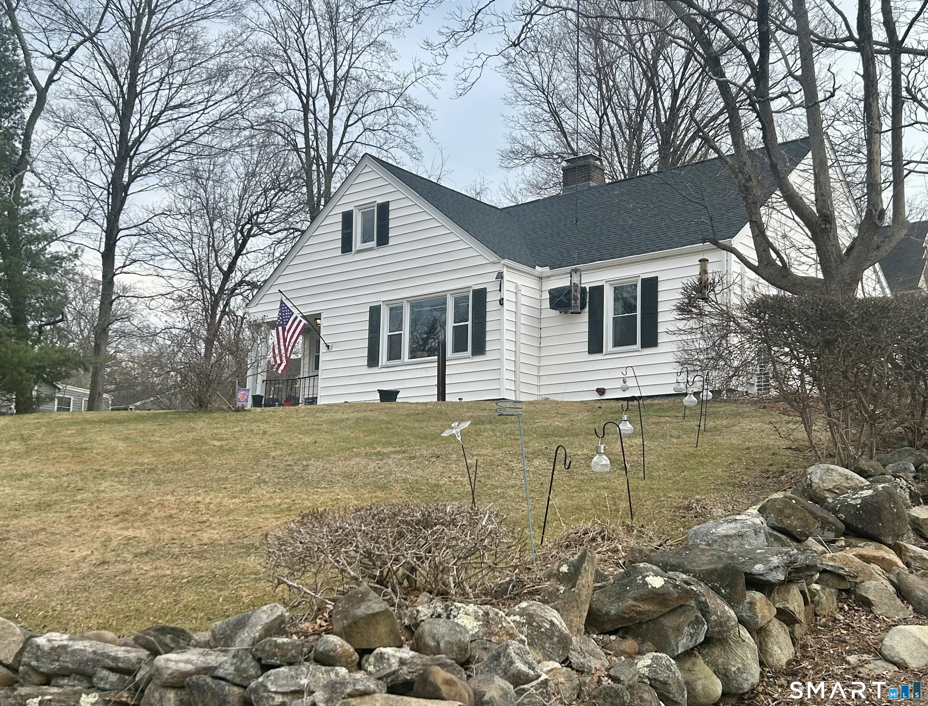 7 East Lake Road Trumbull, CT 06611 - Photo 5 of 42 a view of a house with a yard