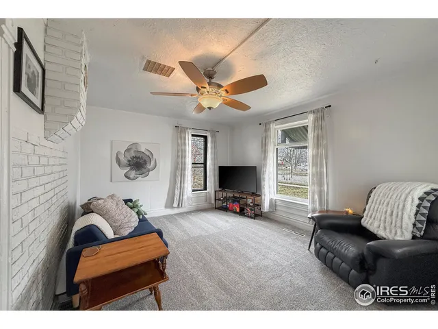 a kitchen with a sink cabinets and utility