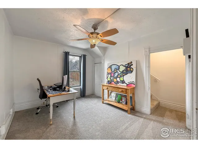 a bedroom with a bed and a cabinets