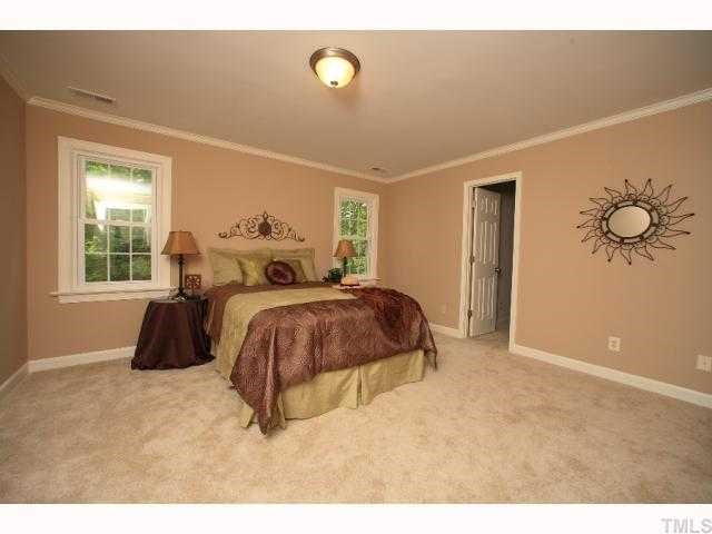 13005 Strickland Road Raleigh, NC 27613 - Photo 6 of 12 Master Bedroom