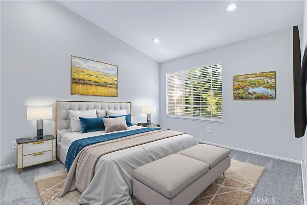 78 Costero Aisle, Unit 301 Irvine, CA 92614 - Photo 20 of 38 a bedroom with bed and painting on the wall