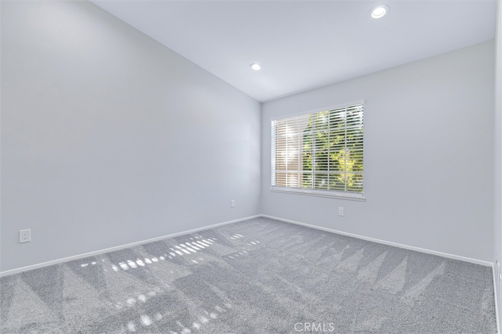 78 Costero Aisle, Unit 301 Irvine, CA 92614 - Photo 21 of 38 a view of an empty room with a window