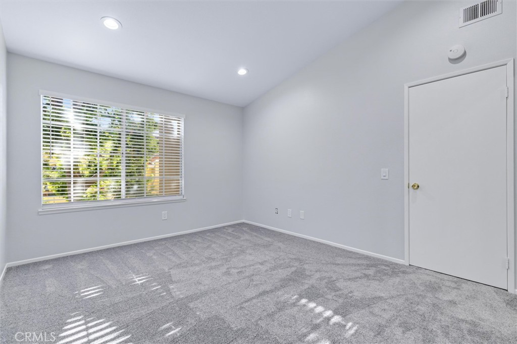 78 Costero Aisle, Unit 301 Irvine, CA 92614 - Photo 22 of 38 a view of an empty room with a window