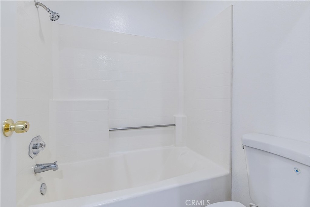 78 Costero Aisle, Unit 301 Irvine, CA 92614 - Photo 24 of 38 a close up of a bathtub in a bathroom