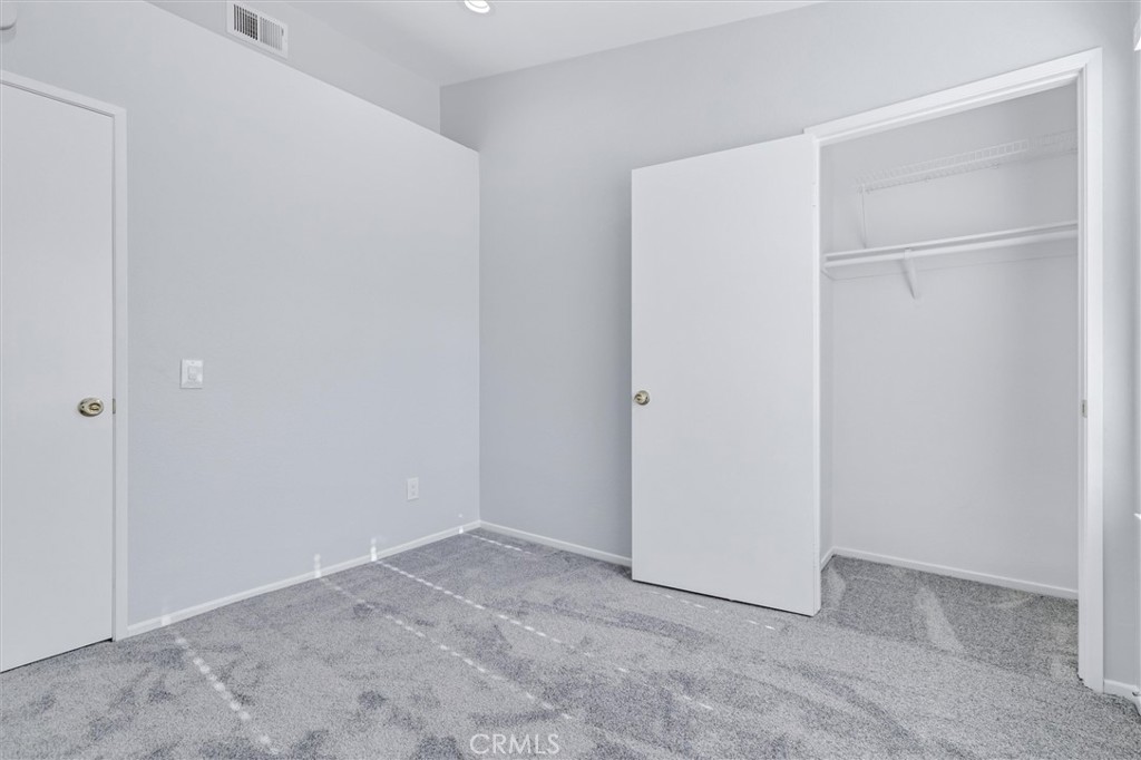 78 Costero Aisle, Unit 301 Irvine, CA 92614 - Photo 26 of 38 a view of an empty room