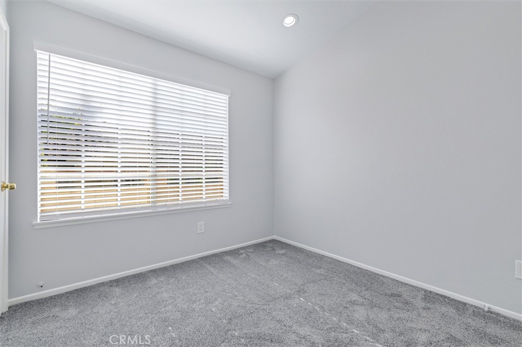 78 Costero Aisle, Unit 301 Irvine, CA 92614 - Photo 28 of 38 an empty room with a window