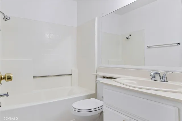 a view of multiple houses with a yard