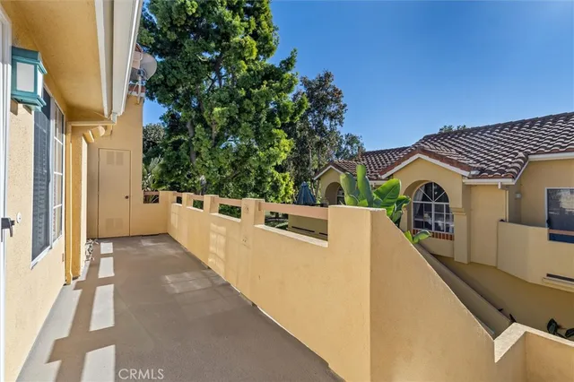a view of a house with a street