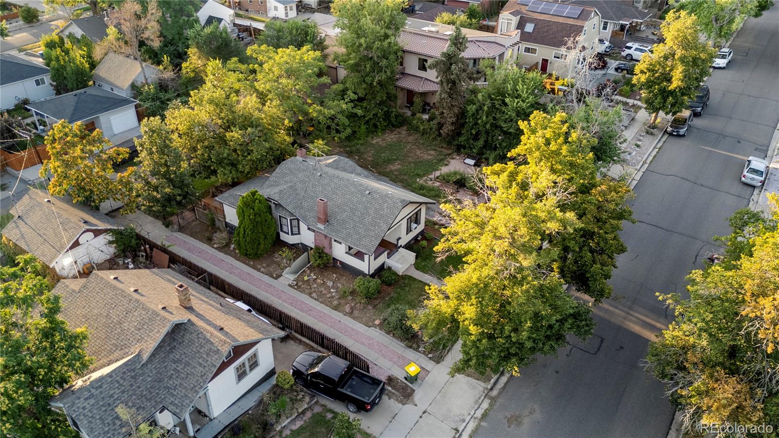 3009 Depew Street Wheat Ridge, CO 80214 - Photo 29 of 32 an aerial view of multiple houses with yard