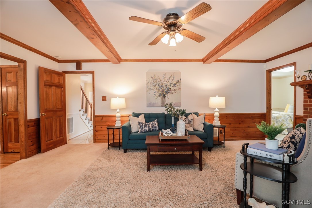8510 Katy Reid Road Chesterfield, VA 23832 - Photo 15 of 50 a living room with furniture and a chandelier