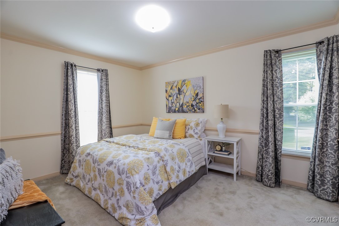 8510 Katy Reid Road Chesterfield, VA 23832 - Photo 24 of 50 a bedroom with a bed and a window