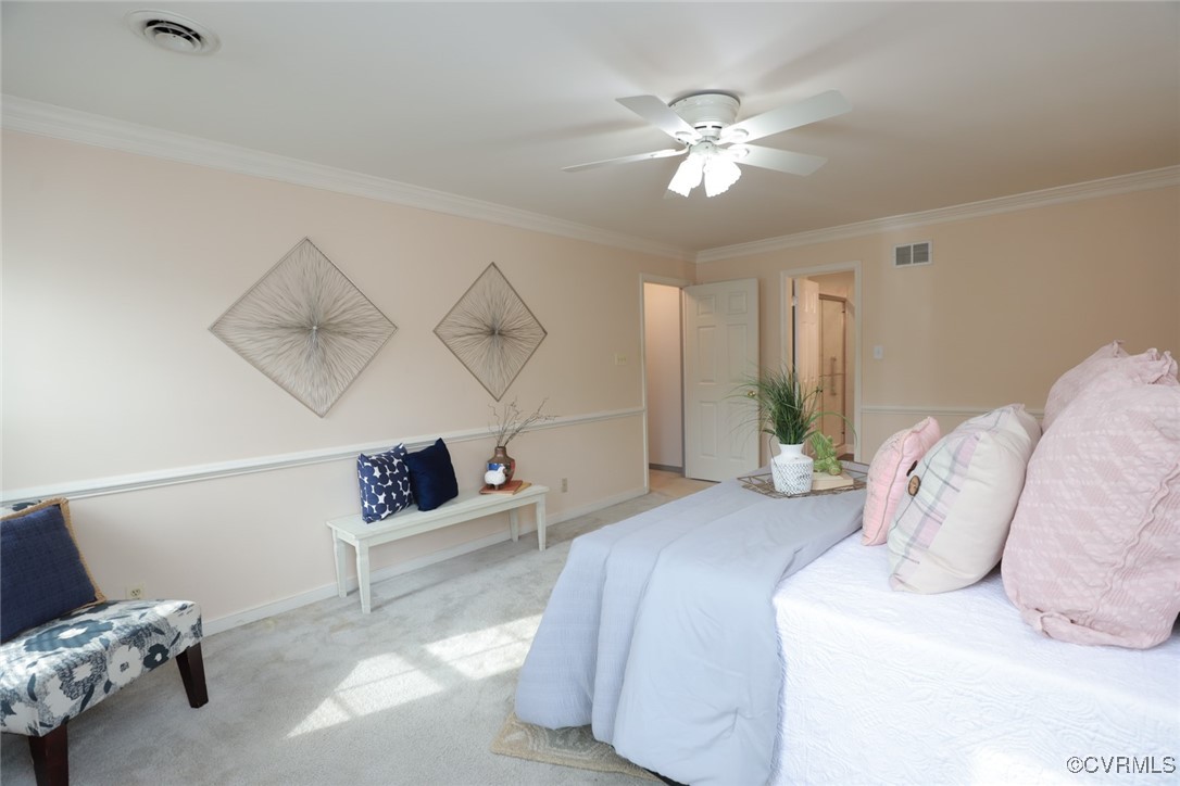 8510 Katy Reid Road Chesterfield, VA 23832 - Photo 31 of 50 a bedroom with a bed and ceiling fan