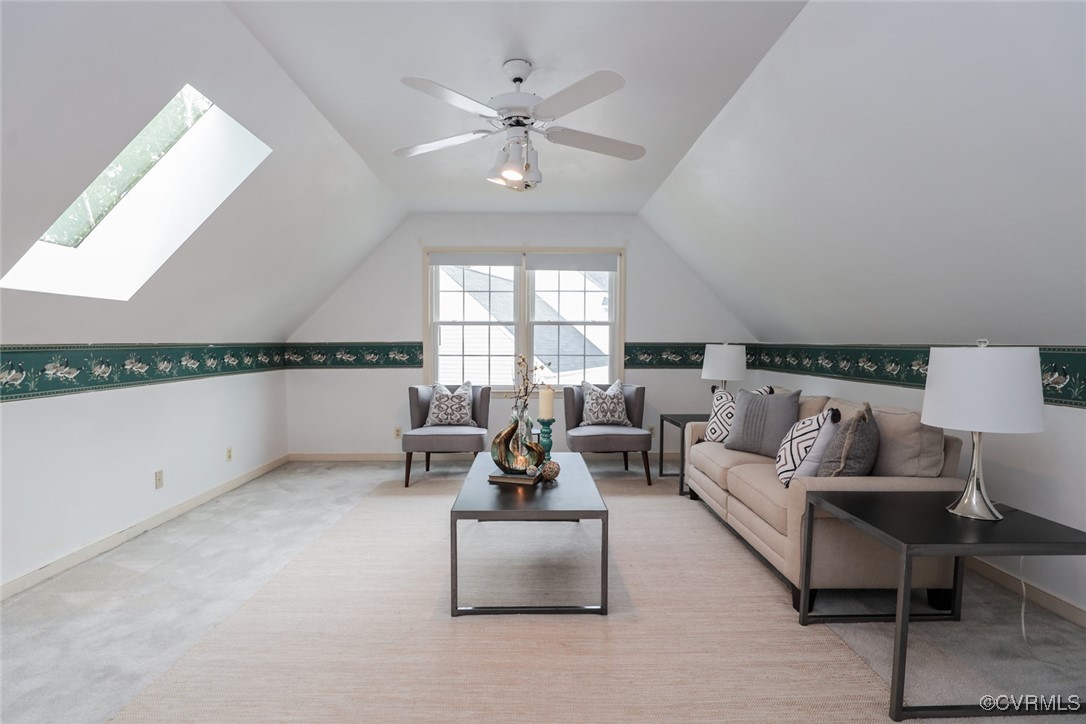 8510 Katy Reid Road Chesterfield, VA 23832 - Photo 33 of 50 a living room with furniture and a chandelier