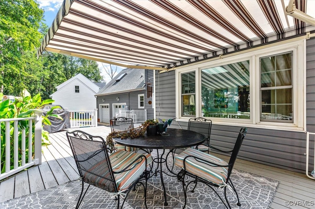 8510 Katy Reid Road Chesterfield, VA 23832 - Photo 44 of 50 a view of a patio with a table and chairs and couches