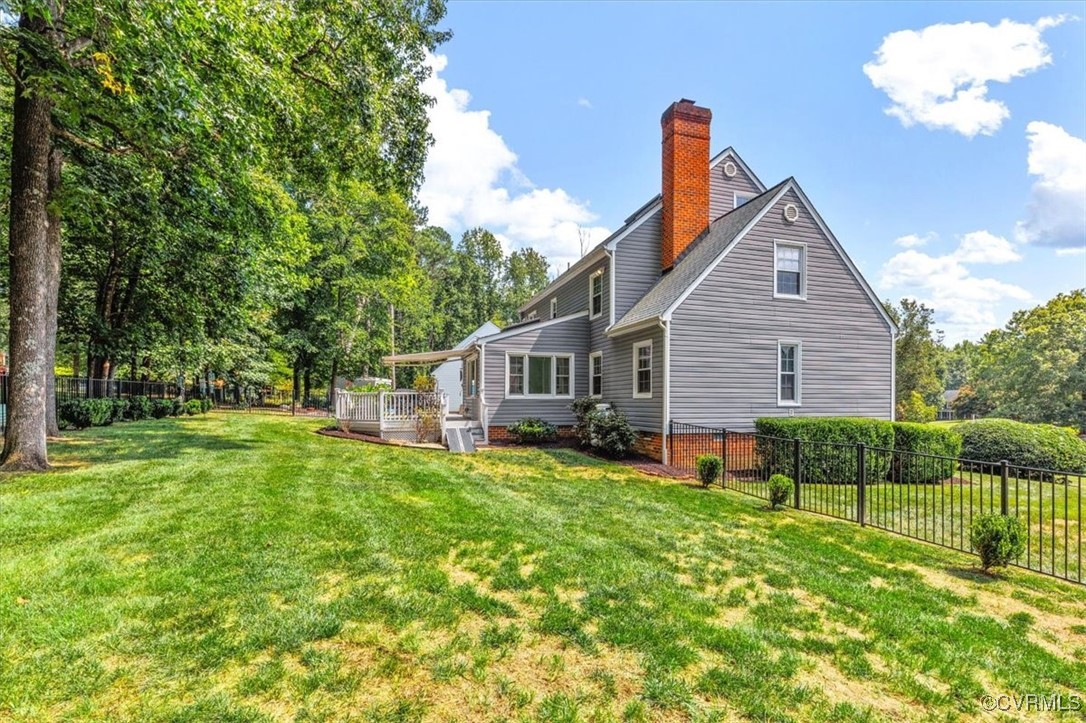 8510 Katy Reid Road Chesterfield, VA 23832 - Photo 47 of 50 a front view of a house with garden