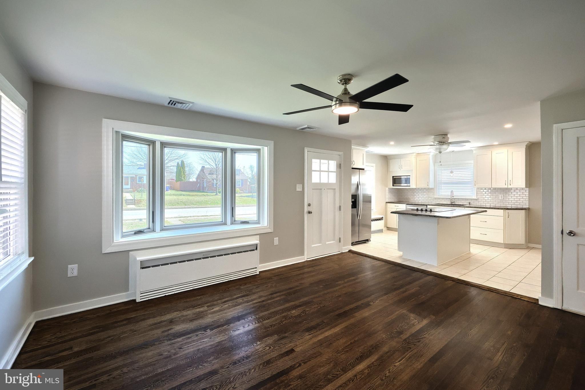 106 North Williams Street York, PA 17404 - Photo 17 of 42 a view of a kitchen with a sink and wooden floor