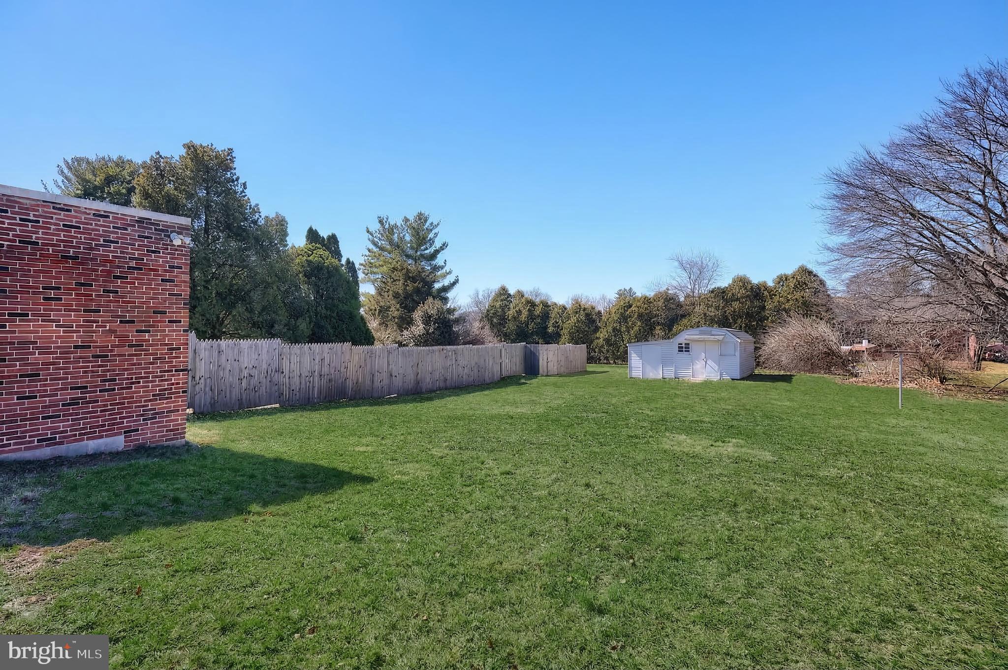 106 North Williams Street York, PA 17404 - Photo 9 of 42 a backyard of a house with lots of green space