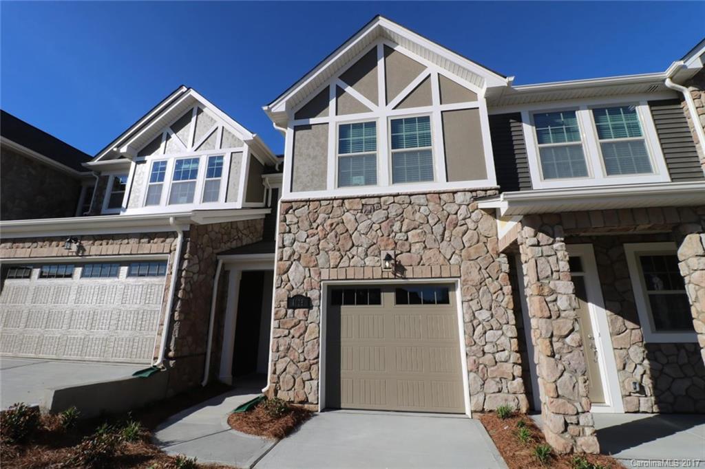 1108 Roderick Drive Fort Mill, SC 29708 - Photo 1 of 19 a front view of a house with a yard