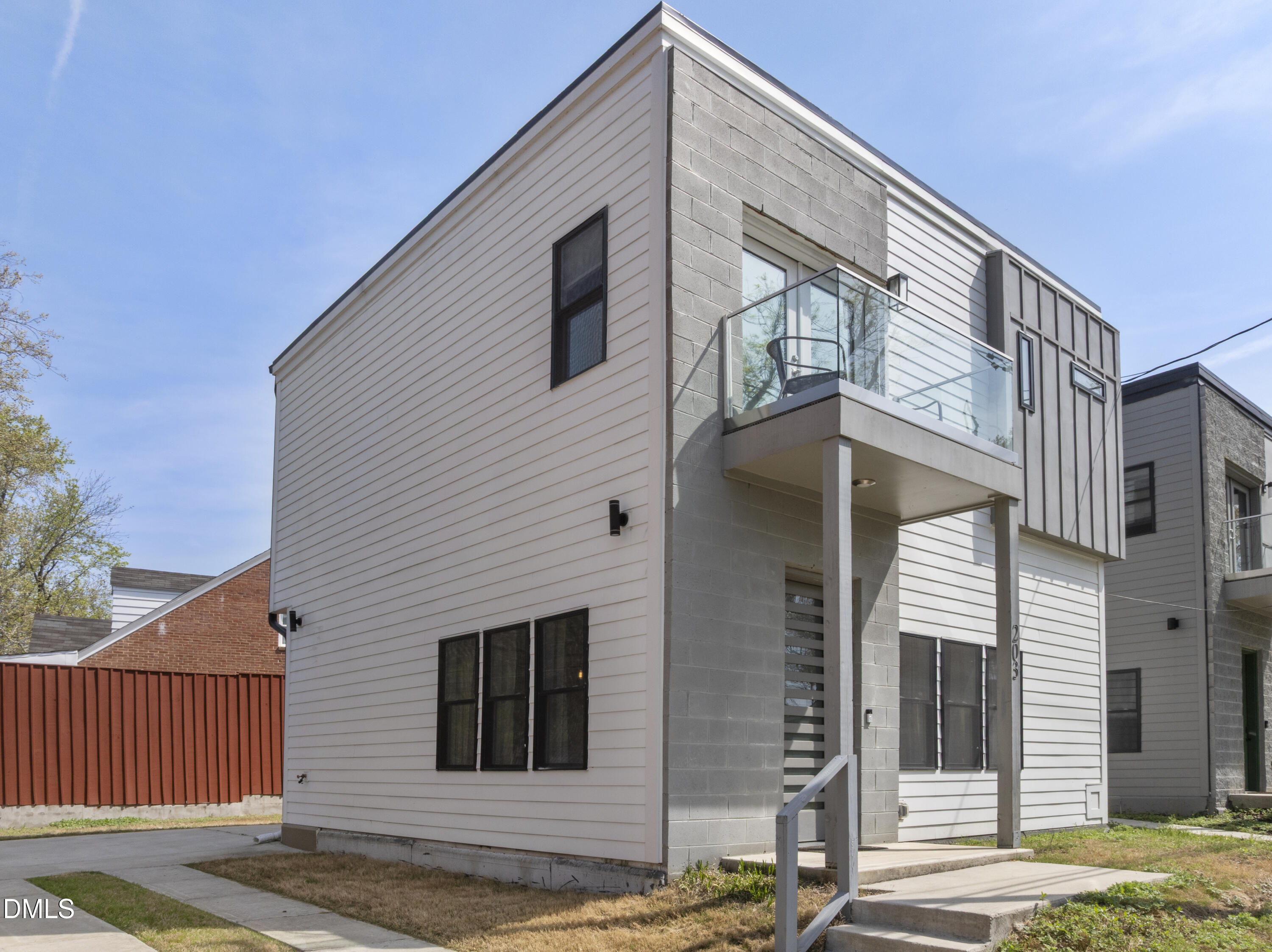 203 Nelson Street Durham, NC 27707 - Photo 2 of 29 a view of a house with a street