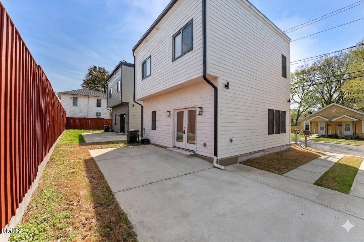 203 Nelson Street Durham, NC 27707 - Photo 27 of 29 a view of a house with a yard